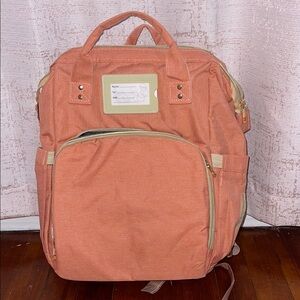 Orange diaper bag with Multiple Pockets and uses